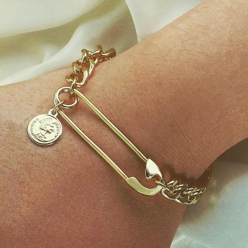 Multiple Chunky Chains With Coin Head Charm Bracelet